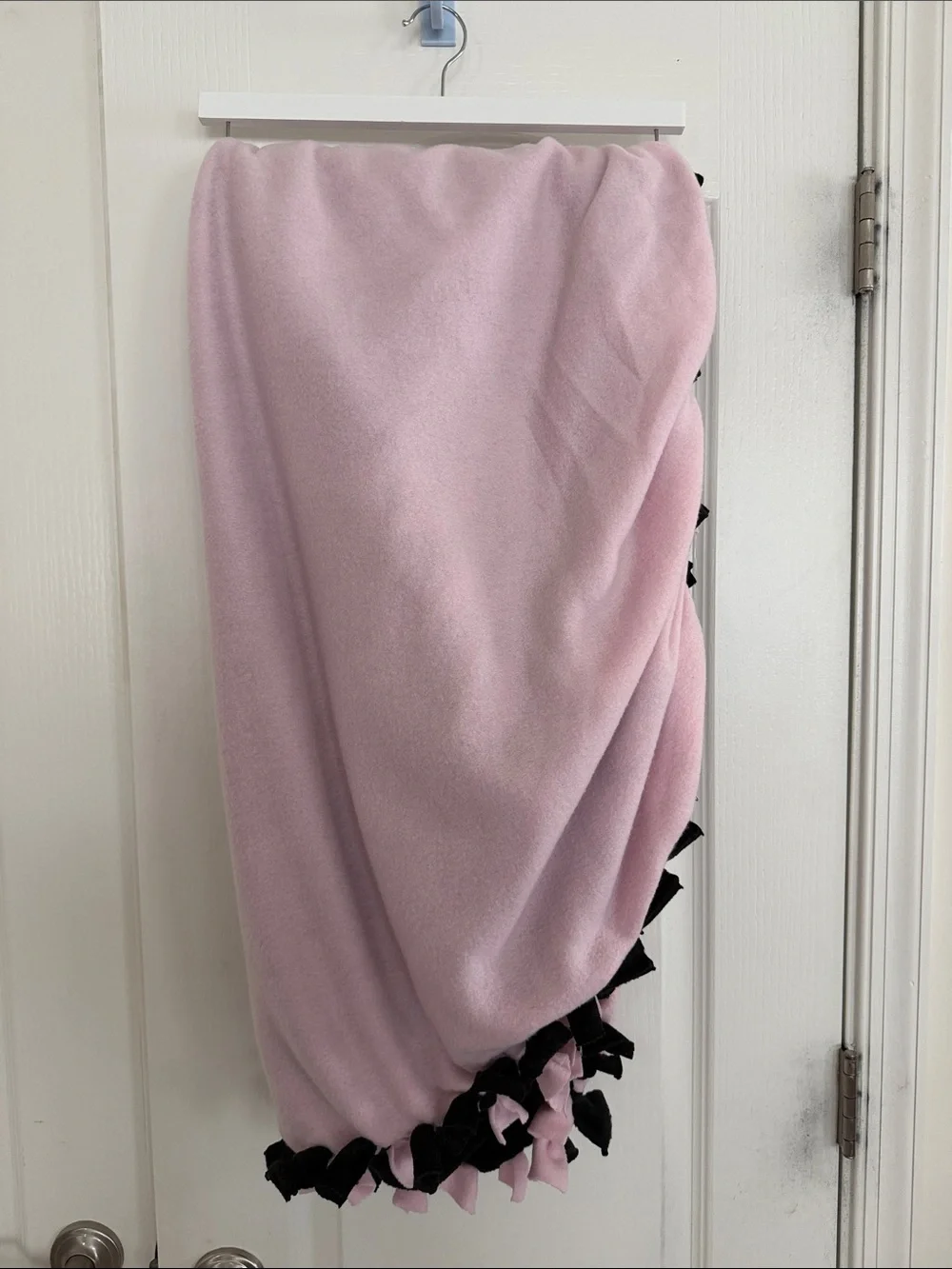 Reversible Black and Pale Pink Fleece Tie-Edge Blanket